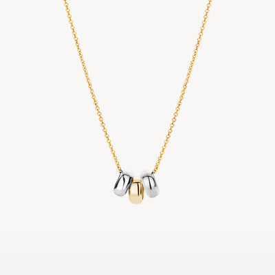 Bicolor ketting met schakels van 14k geel, wit en rosé goud, drie hangertjes.