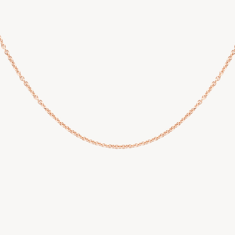 Fijne ketting van 14k rosé goud met kleine schakels in bicolor goud.