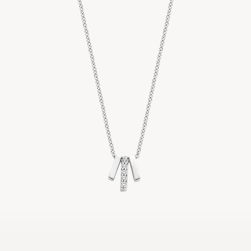 Ketting van 14k wit goud met fijne schakels en drie hangers met zirkonia.