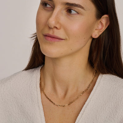 14k geelgouden schakelketting met grove schakels, bicolor goud uitstraling.