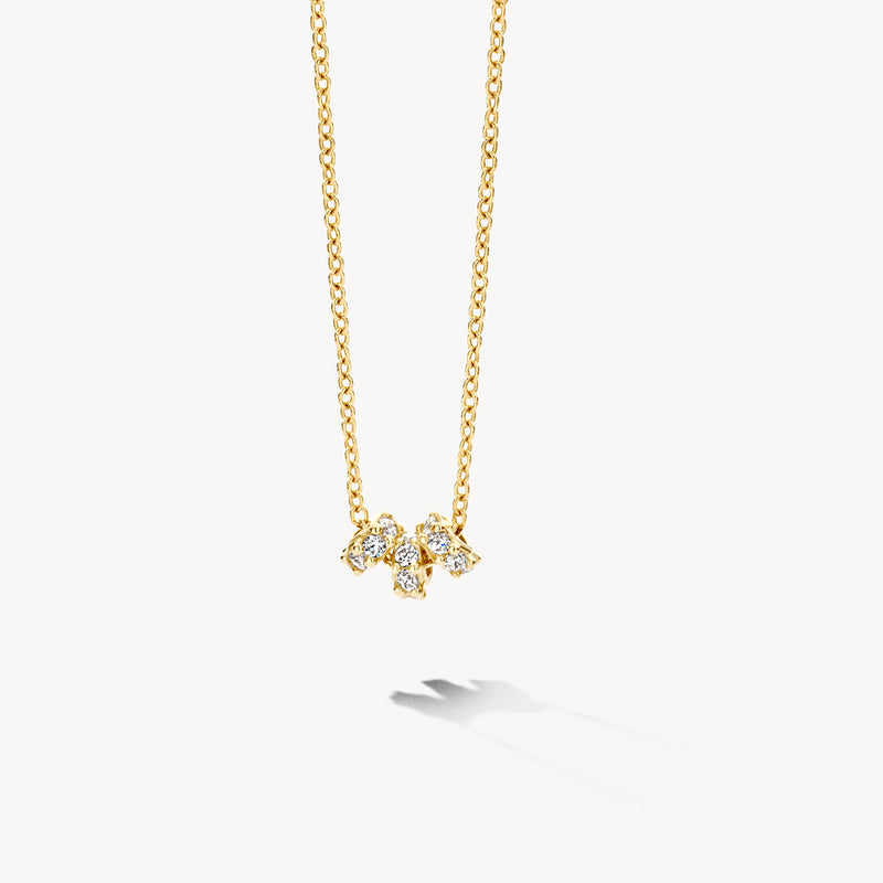 Ketting van 14k geelgoud met drie glinsterende zirkonia hangers aan fijne ketting.