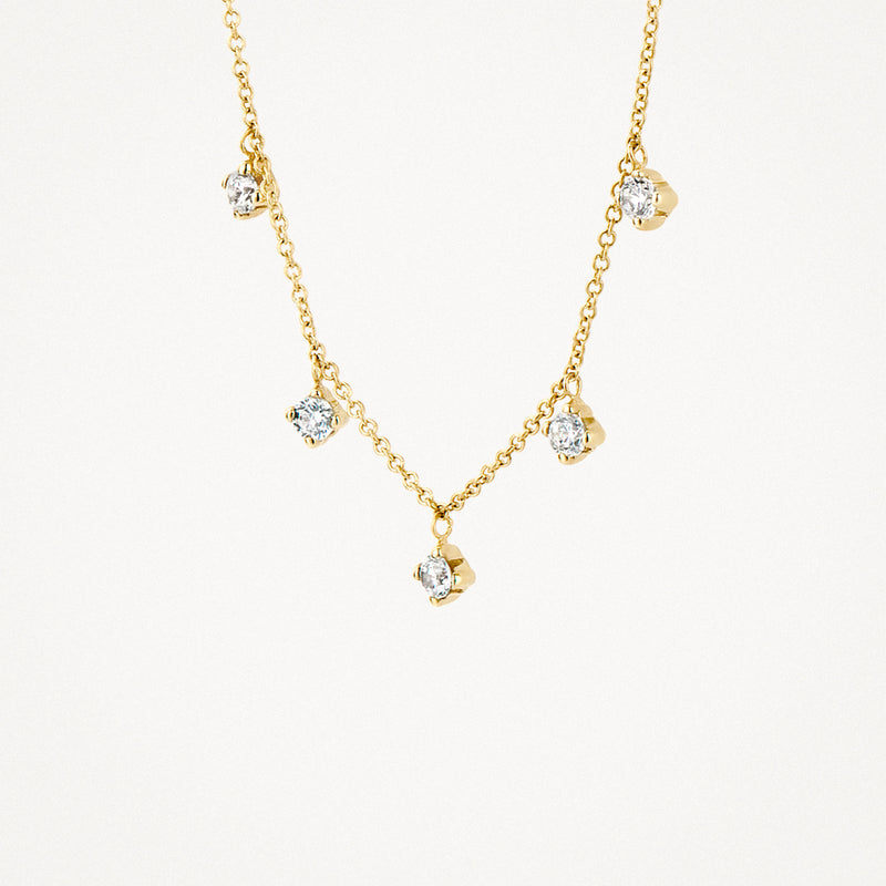 Halskette aus 585er Gelbgold mit feinen Gliedern und vier funkelnden Zirkoniasteinen.