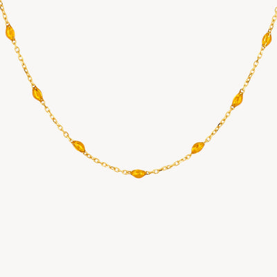14k geelgouden fijne schakelketting met caramel resin accenten in bicolor goud.