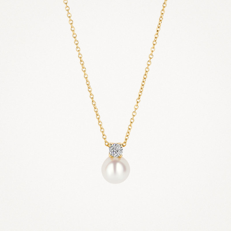 14k geelgouden ketting met ronde parel en zirkonia hanger.