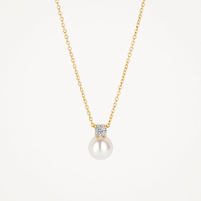 14k yellow gold necklace with round pearl and Zirconia pendant.