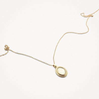 Necklace of 14k Yellow gold with oval pendant of Mother-of-pearl and Rock crystal.
