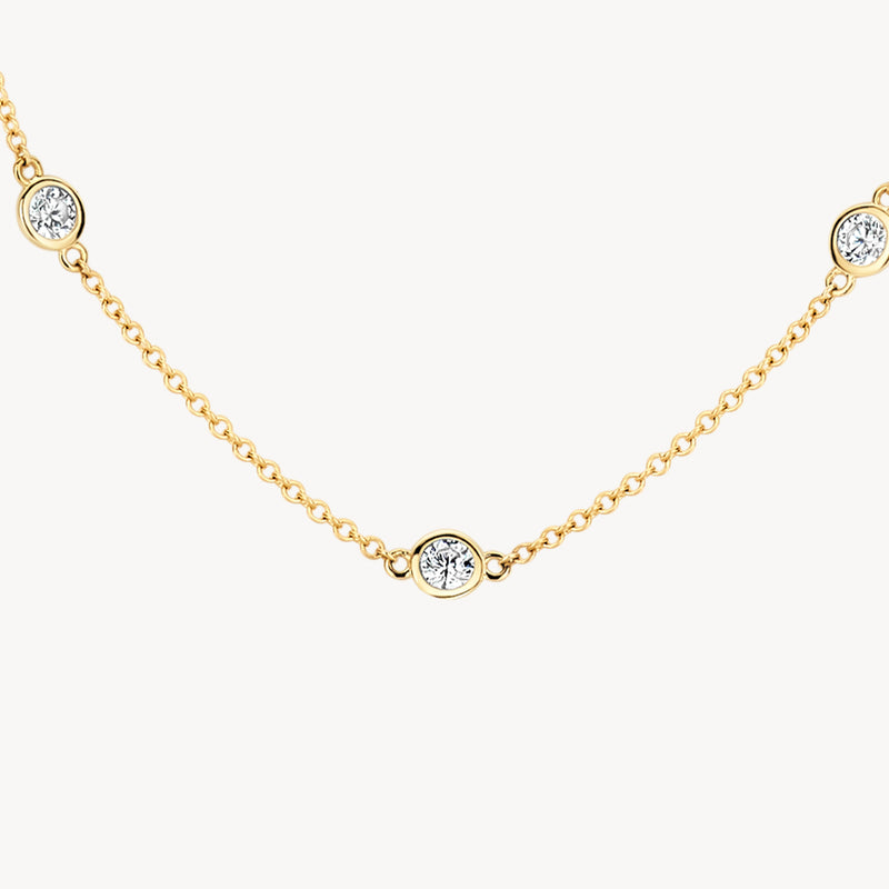 14k geelgouden ketting met fijne schakels en zirkonia stenen inzet.