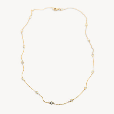 14k yellow gold fine link chain with small Zirconias spaced evenly.