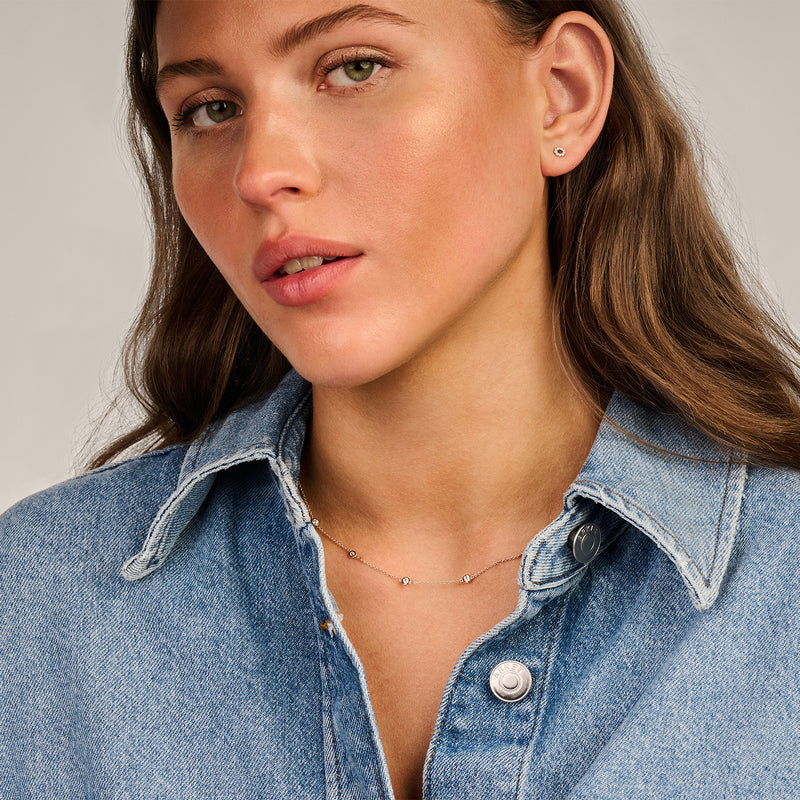 Bicolor goud ketting 14k goud met fijne schakels en subtiele zirkonia strand.