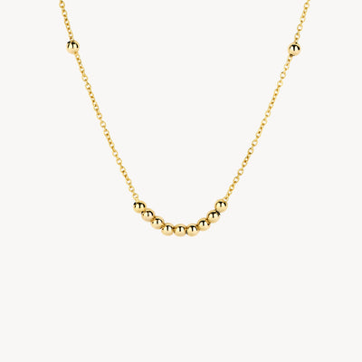 14k yellow gold necklace with shiny beads on fine links.