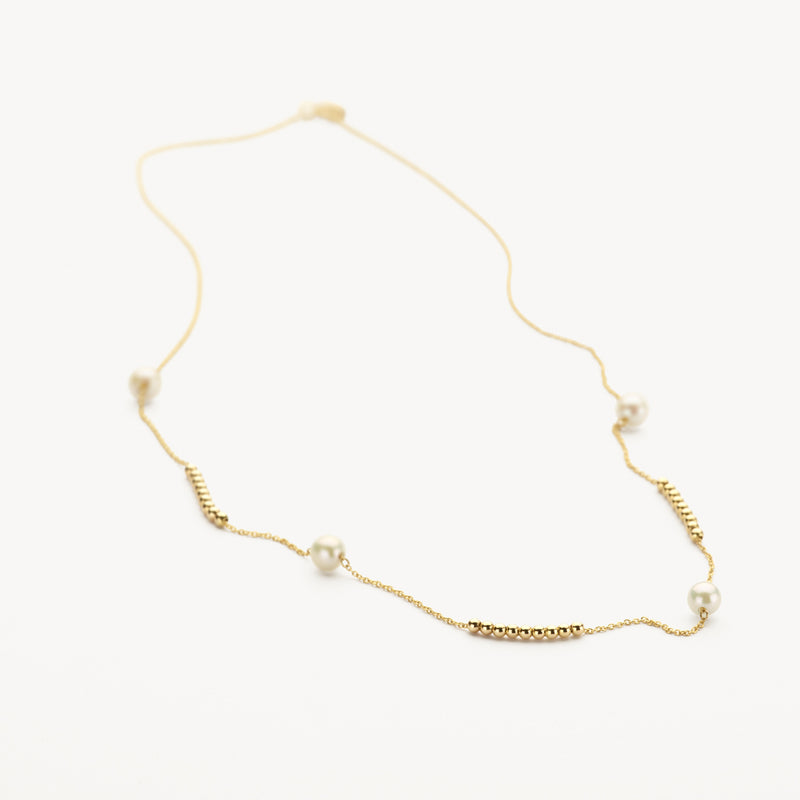 14k geelgouden ketting met parels en delicate schakels in bicolor goud.