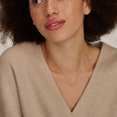 Bicolor gouden ketting met fijne schakels en zirkonia in 14k wit en rosé goud.