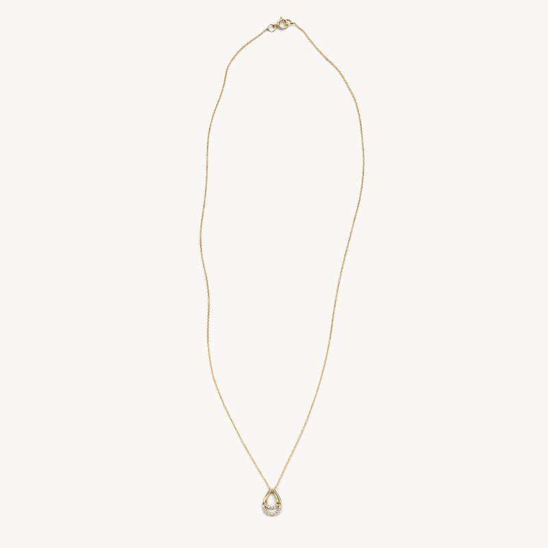 Halskette aus 585er Gold mit feinem Glied und tropfenförmigem Zirkonia-Anhänger.