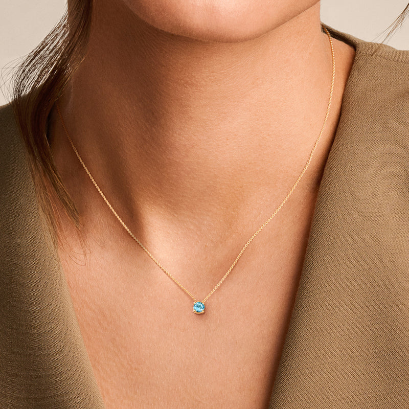 Collier pendentif topaze bleue en or 14 carats