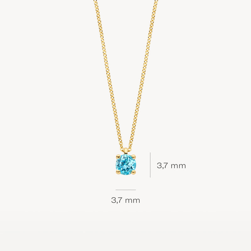 Collier en or jaune 14k avec topaze bleue ronde mesurant 3,7 mm.