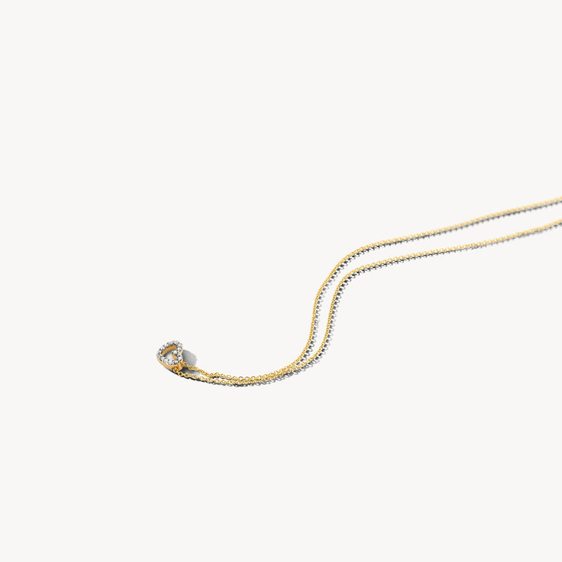 Bicolor collier van 14k goud met witte en gele goud schakels en diamanten hanger.