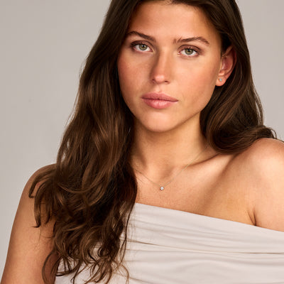 Delicate bicolor collier met 14k geel en wit goud en kleine diamant aan fijne schakel.