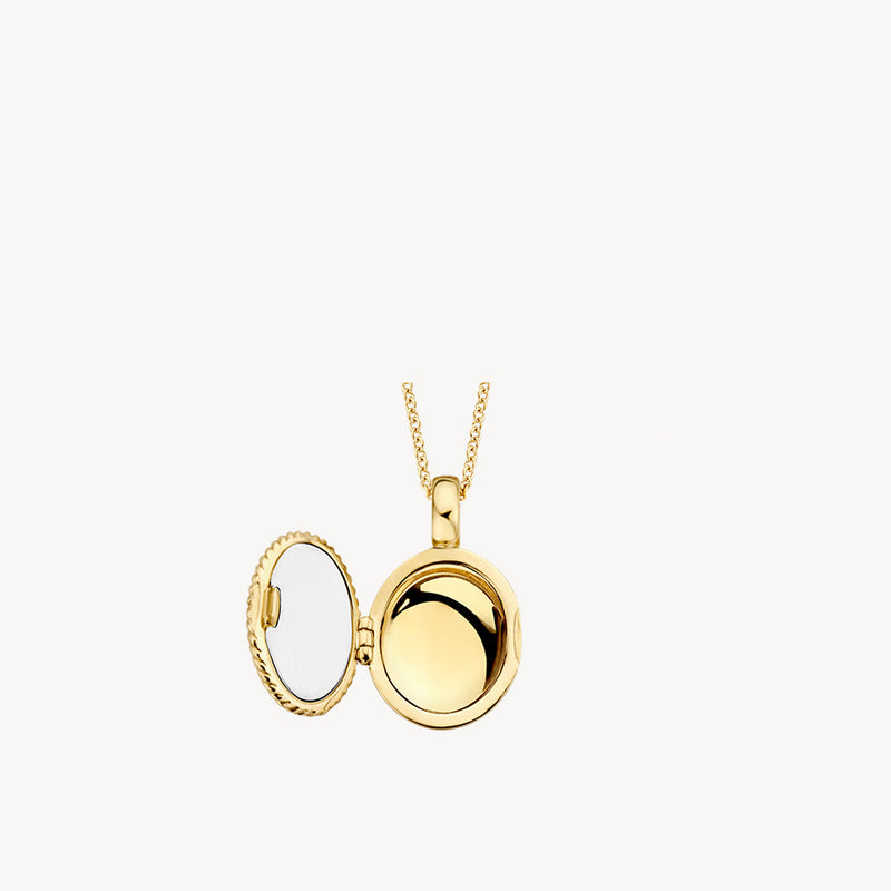 Rond medaillon van 14k geelgoud met spiegel en vergulde ketting.