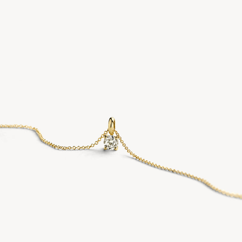 14k geel goud hanger met solitaire zirkonia en fijne ketting.