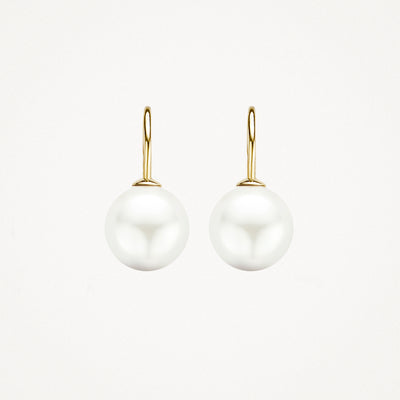 Oorbellen met grote witte Swarovski parel en 14k geel goud haak sluiting.