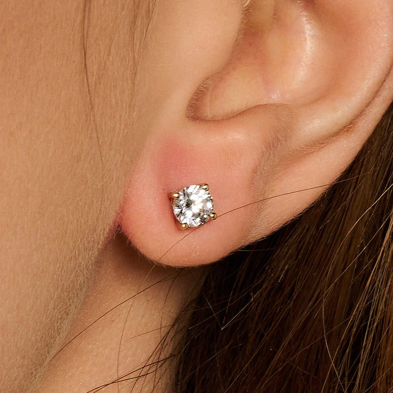 Clous d'oreilles avec zircone 5 mm en or jaune 14 carats