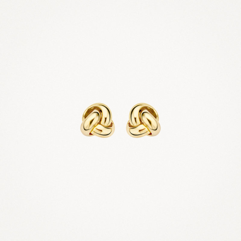 Glinsterende 14k geelgouden oorknoppen met knoopvormig design.