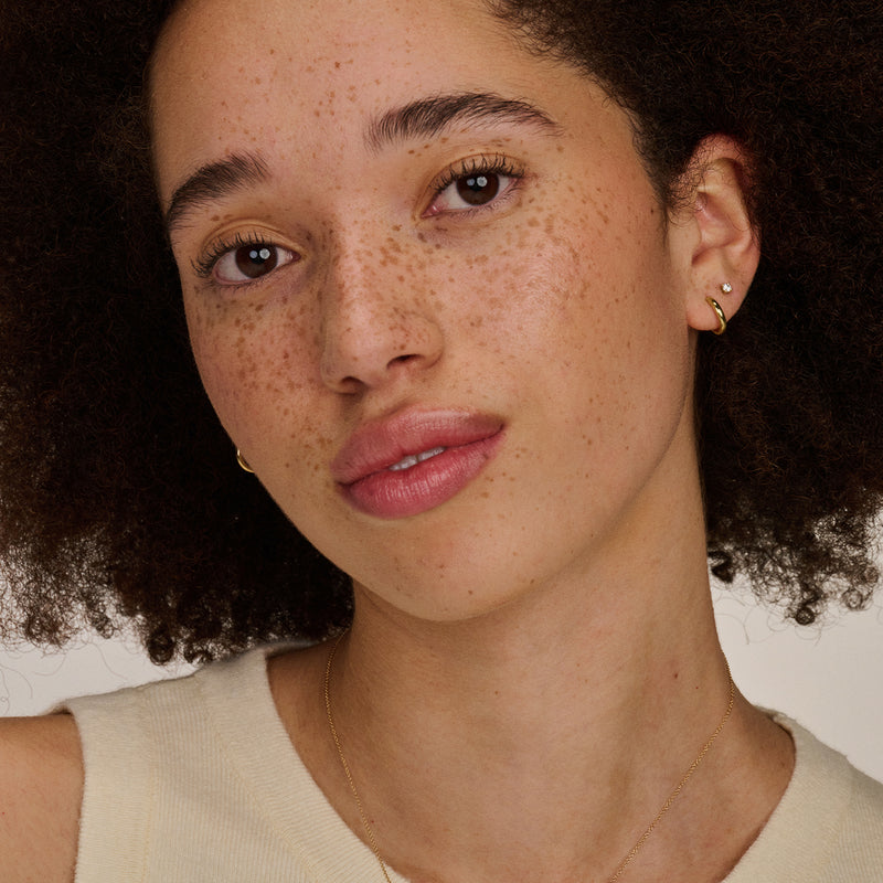 Oorring 7203YGO van 14k geelgoud met subtiel glanzend oppervlak.