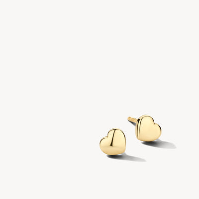 14k goud oorknoppen in hartvorm met glad oppervlak.