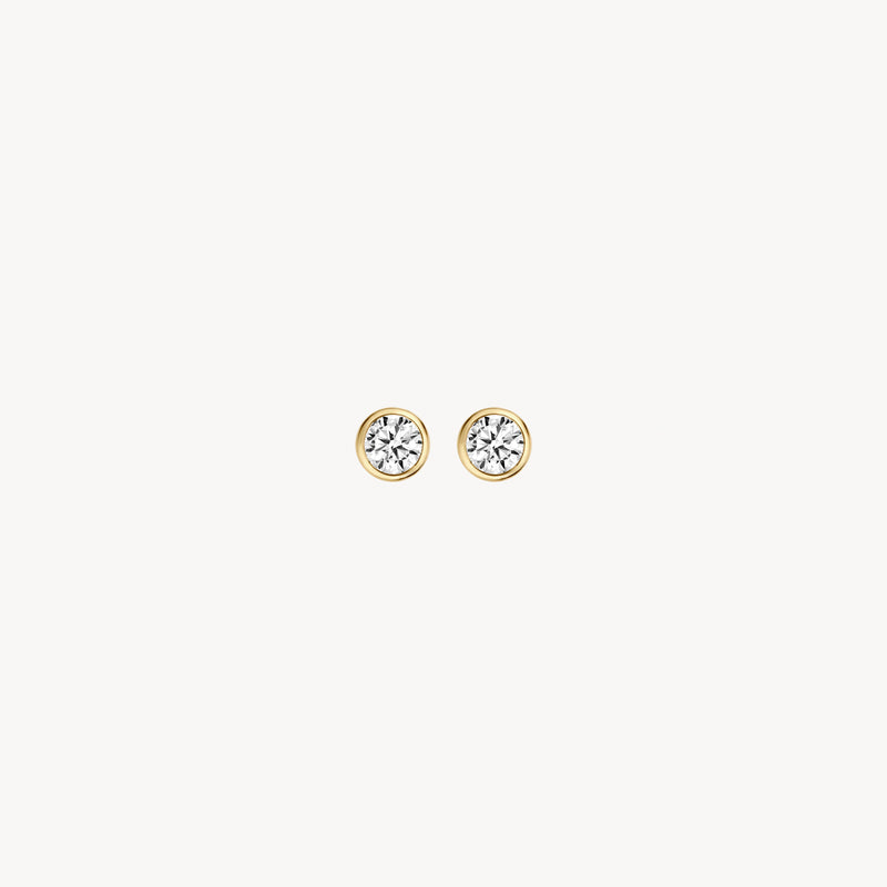 Puces d'oreilles en or jaune 14k avec des Zircones rondes en sertissage simple.