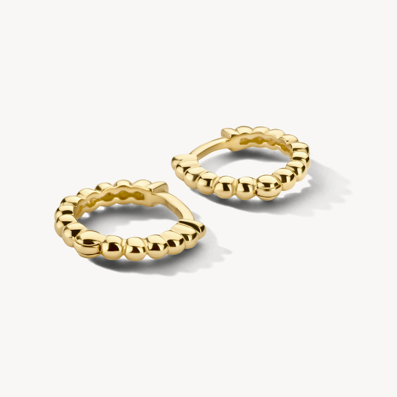 Anneaux d'oreilles en or jaune 14k avec détails sphériques et fermoir solide.