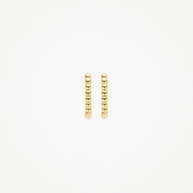 Anneaux d'oreilles en Or jaune 14k avec des petites boules enfilées.