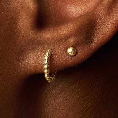 Oorringen met bolletjesmotief 10,7 mm 14k goud