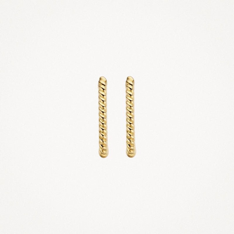 Créoles d'oreilles d'or jaune 14k avec texture torsadée et forme droite.