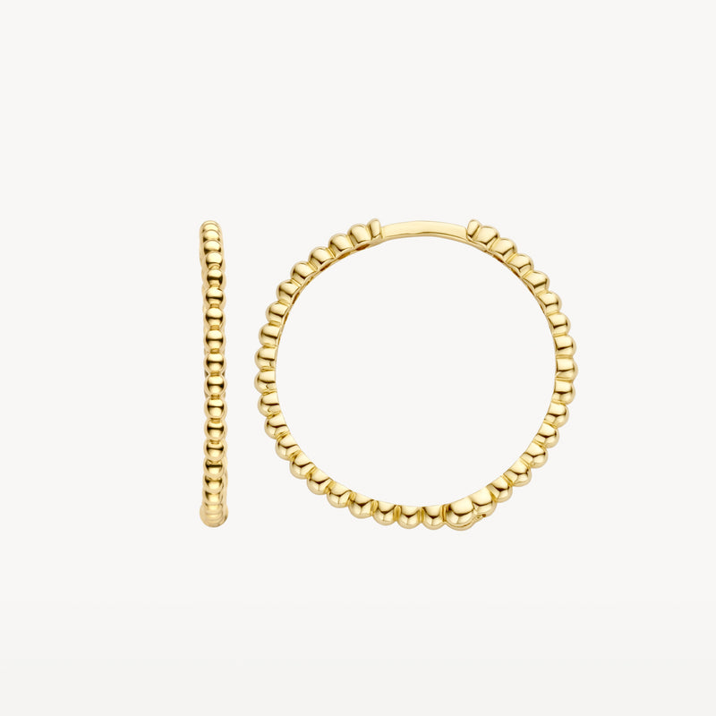 Anneaux d'oreilles en Or jaune 14k avec texture nervurée, de forme ronde.