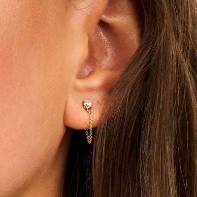 Oorbellen met kettinkje en ⌀ 3 mm zirkonia 14k goud