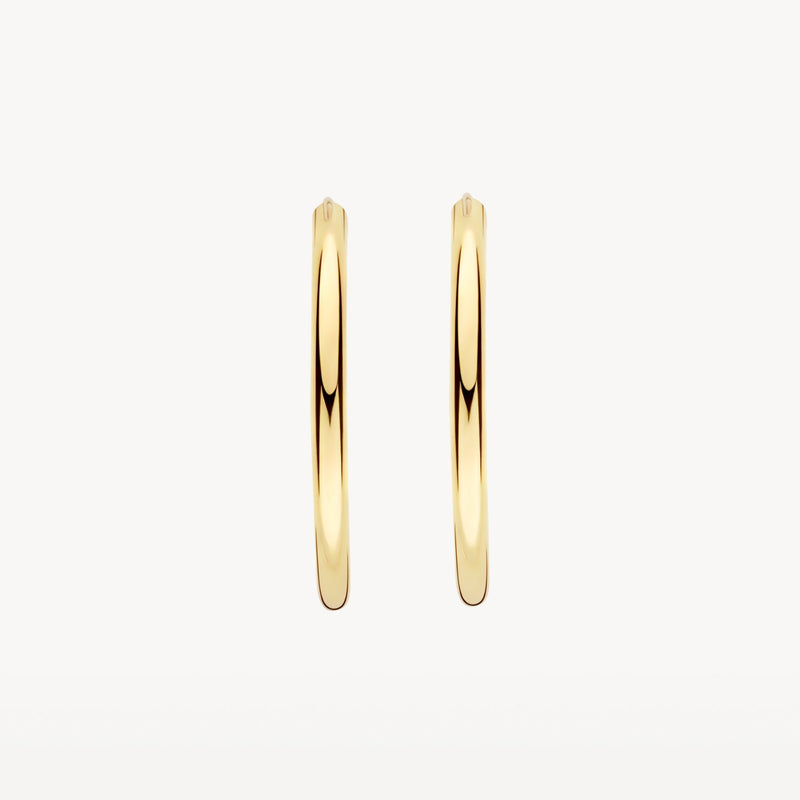 Véritable bague ronde en or jaune 14 carats Créoles avec finition polie, gros plan.
