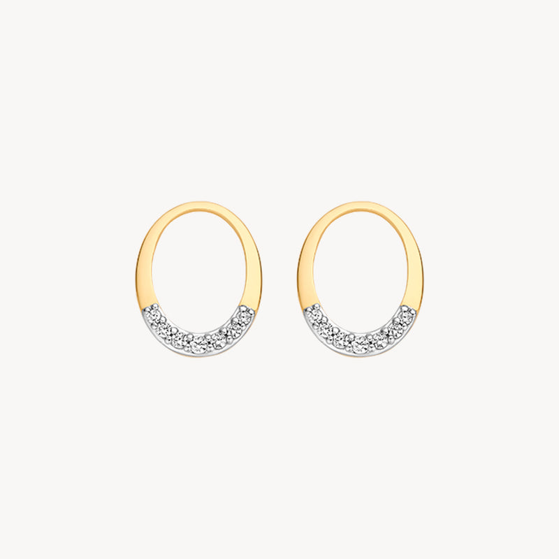 Boucles d'oreilles ovales en or jaune 14k avec Zircone en bas.