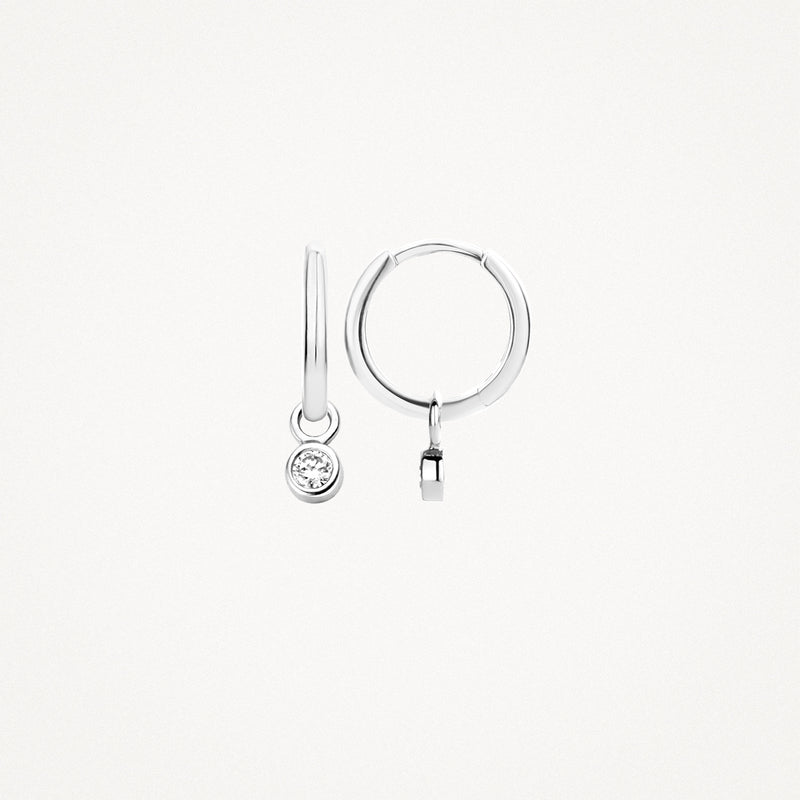 Oorbellen van 14k wit goud met ronde zirkonia hanger aan sluitring.