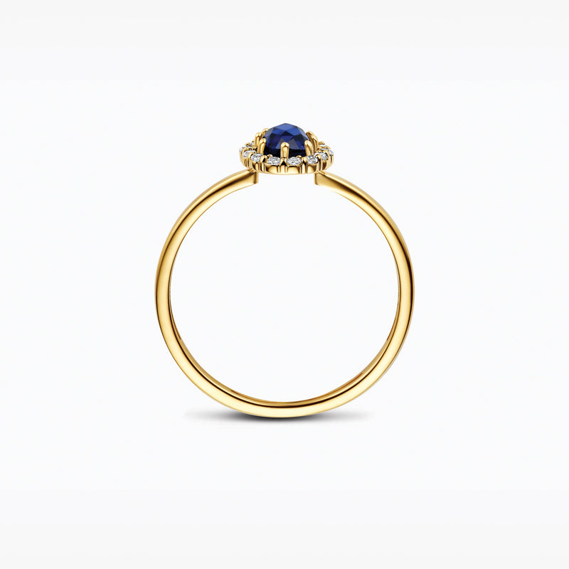 Or 14 carats Jaune et or blanc Bague avec Diamant de synthèse et un diamant bleu, gros plan.