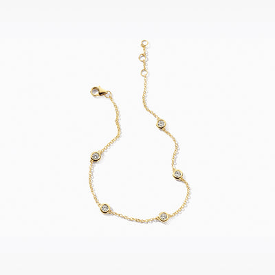 Armband van 14k geelgoud met fijne schakels en 5 ronde Lab Diamonds in gerecycled goud.