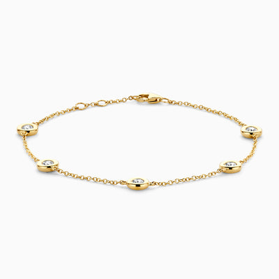 14k geelgouden armband met vijf labdiamanten en fijne schakels van gerecycled goud.