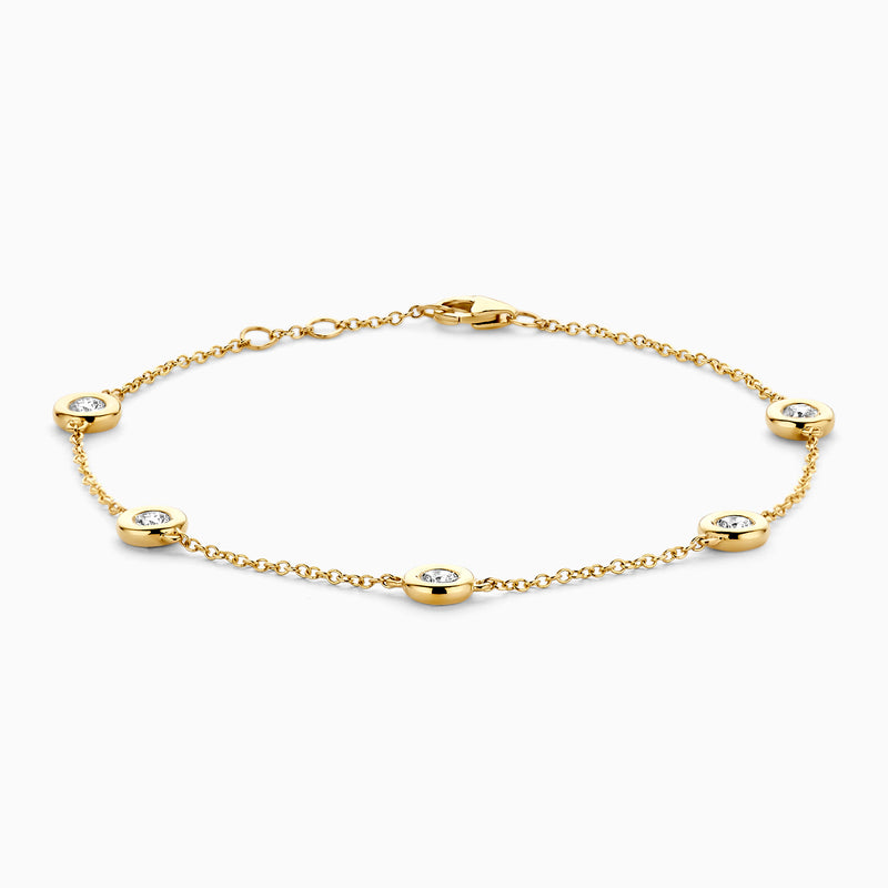 14k geelgouden armband met vijf labdiamanten en fijne schakels van gerecycled goud.