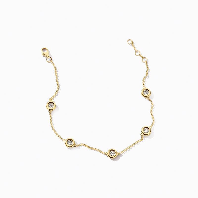 14k geelgouden armband met fijne schakels en vijf Lab Diamonds in ronde zetting.