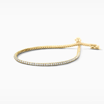 Armband van 14k geel goud met ronde lab diamonds en verstelbare sluiting.