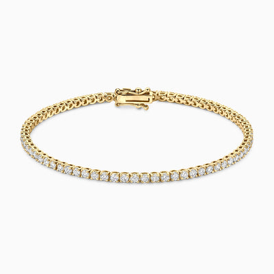 Armband van 14k geelgoud met ronde lab diamanten en fijne schakelketting.