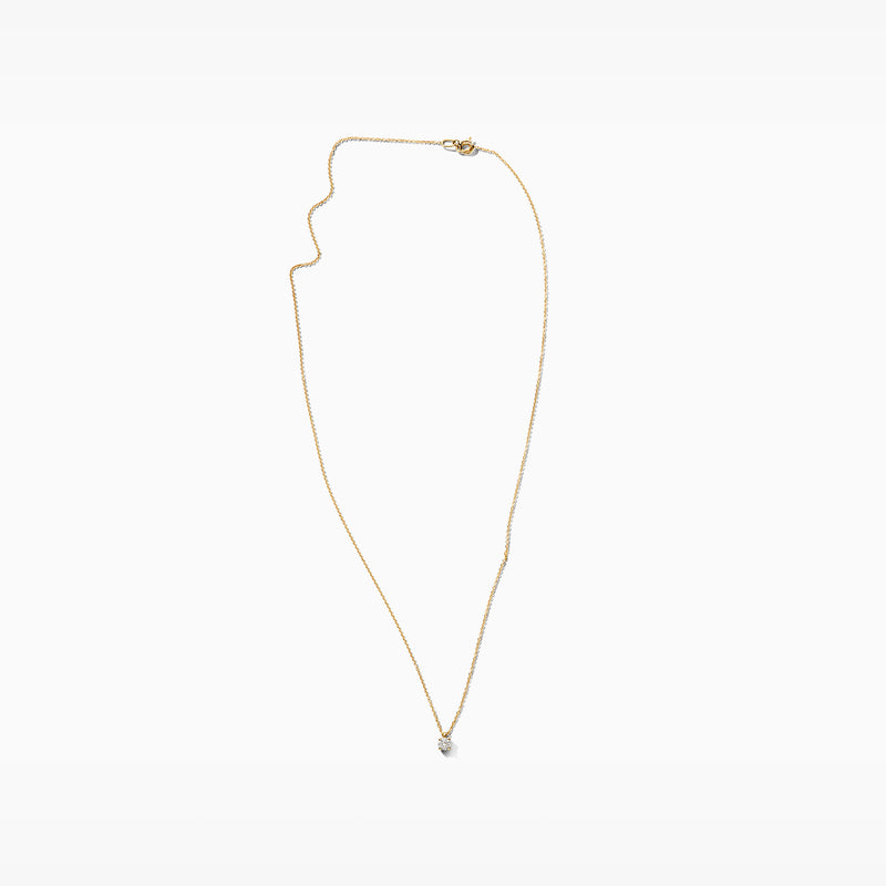 14k goud collier met fijne schakels en een kleine diamanten hanger.