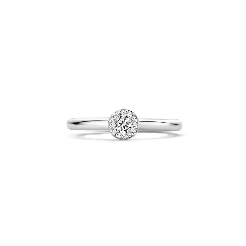 Ring van 14k wit goud met ronde zirkonia en dunne band.