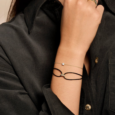 Bicolor armband van 14k goud met wit en rosé goud en schakelontwerp.
