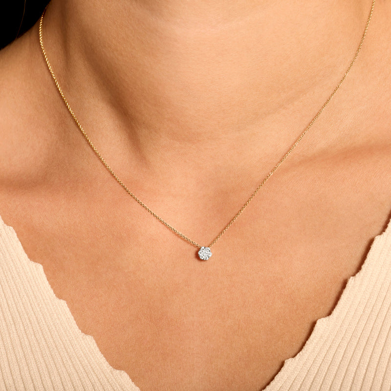 Bicolor collier met solitaire diamant aan dunne ketting van 14k geel goud.