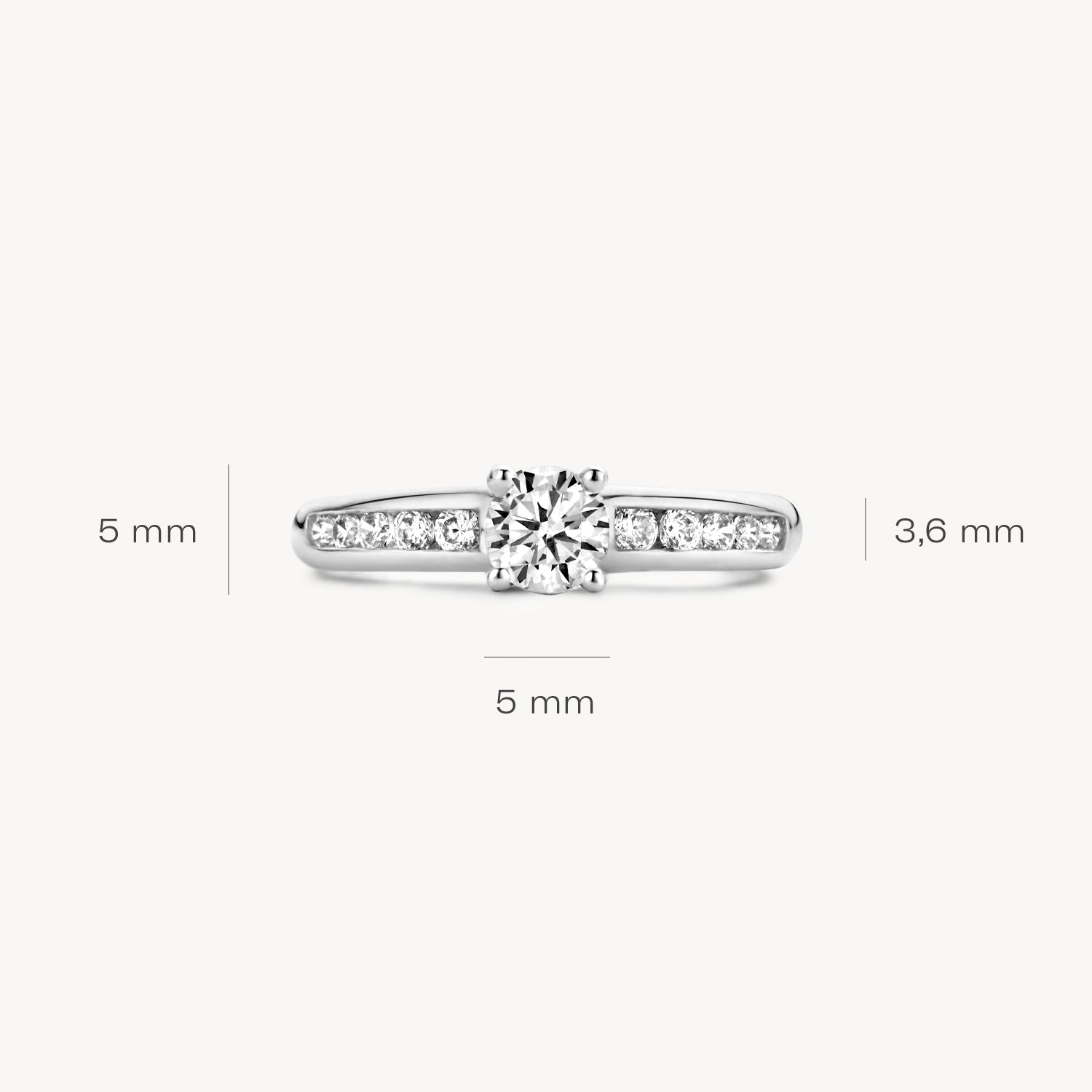 Ring 1154WZI 585er Weißgold mit zentraler zirkonia und Seiten mit kleinen Steinen, 5 mm breit, 3,8 mm hoch.